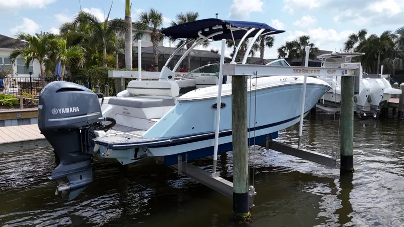 Slide: The Image of 2019 Cobalt 25 SC boat with Yamaha 300 engine on lift, fresh water use. - 3