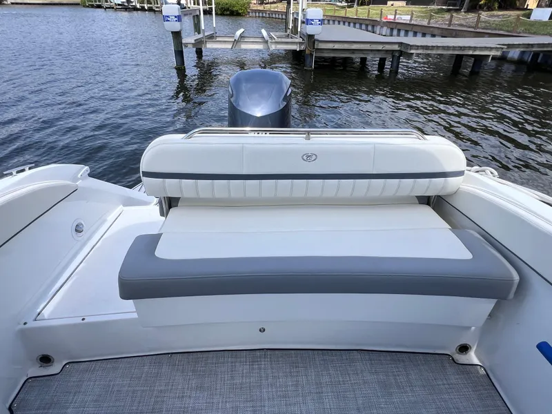 Slide: The Image of 2019 Cobalt 25 SC boat with Yamaha 300 engine, fresh water use, docked by a pier. - 35