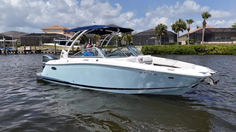 Slide: The Image of 2019 Cobalt 25 SC boat on water, Yamaha 300 engine, fresh water use, 215 hours. - 8