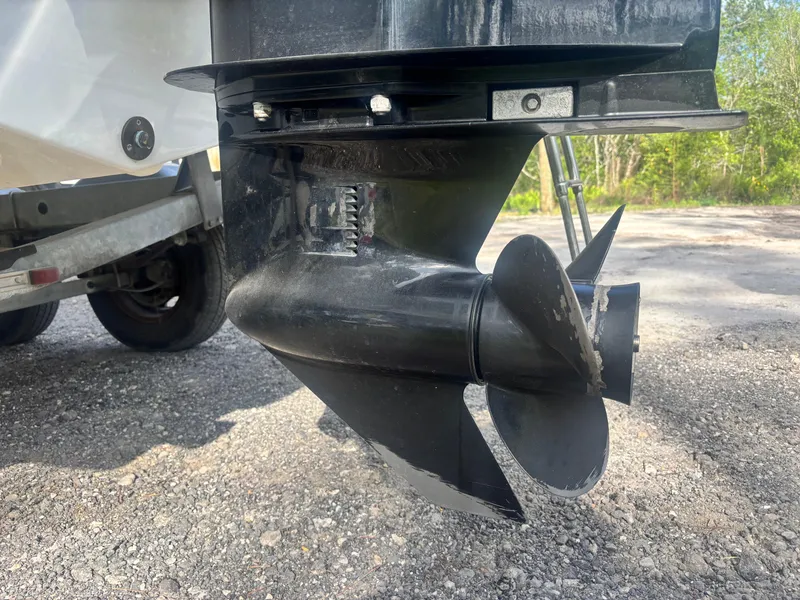 Slide: The Image of Propeller of 2022 Bayliner Trophy T20CX boat on a trailer, close-up view. - 15