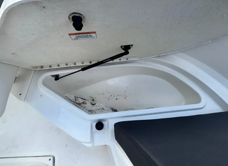 Slide: The Image of Open storage compartment in 2022 Bayliner Trophy T20CX boat. - 29