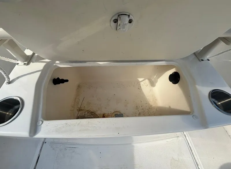 Slide: The Image of Open storage compartment on 2022 Bayliner Trophy T20CX boat. - 43