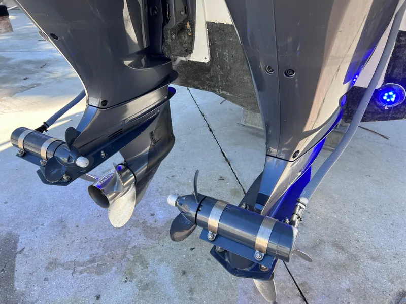 Slide: The Image of Twin Yamaha 250 engines on a 2021 Jeanneau Leader 9.0 WA with bow and stern thrusters. - 10