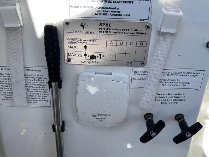 Slide: The Image of 2021 Jeanneau Leader 9.0 WA boat control panel with safety instructions and equipment. - 21