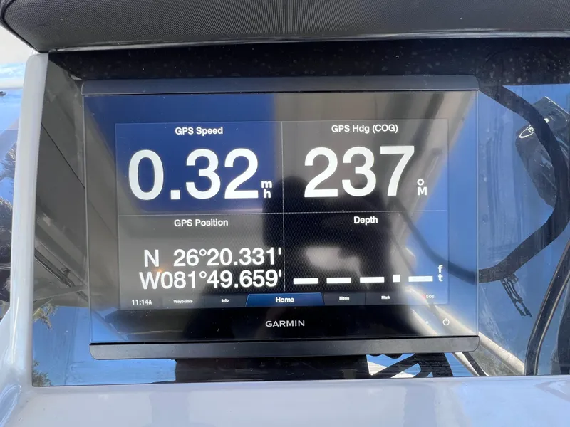 Slide: The Image of Garmin GPS display on 2021 Jeanneau Leader 9.0 WA boat, showing speed and coordinates. - 33