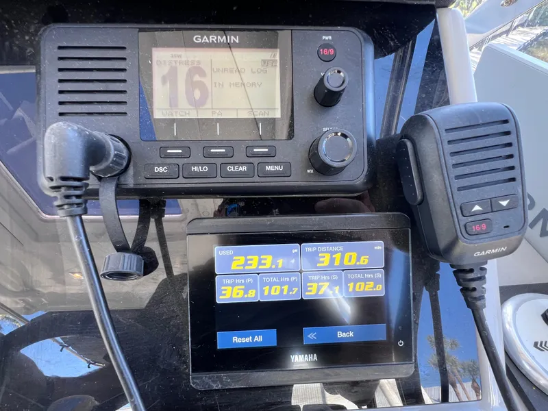 Slide: The Image of Control panel of 2021 Jeanneau Leader 9.0 WA with Garmin and Yamaha displays. - 34