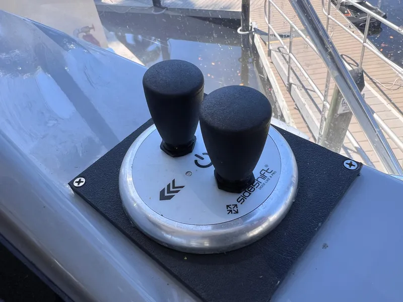 Slide: The Image of Joystick controls on a 2021 Jeanneau Leader 9.0 WA boat. - 36