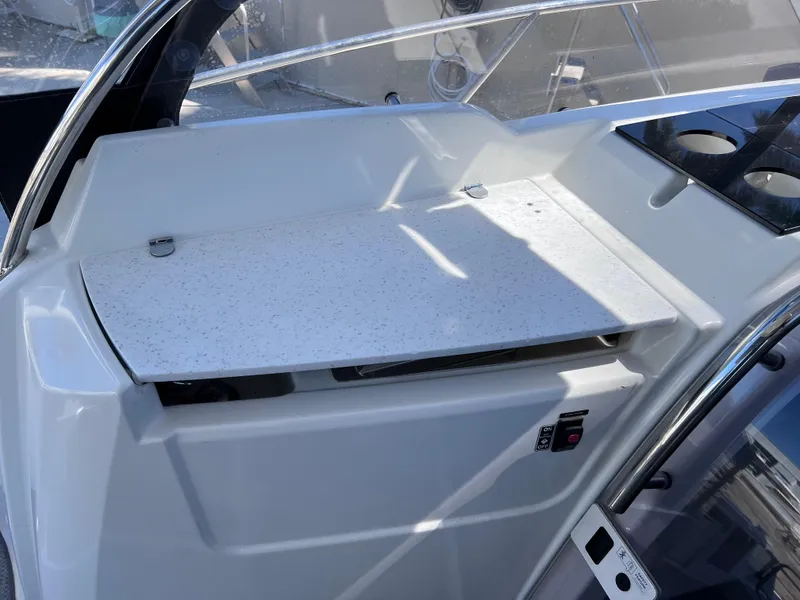 Slide: The Image of 2021 Jeanneau Leader 9.0 WA boat interior with sleek countertop and control panel. - 38