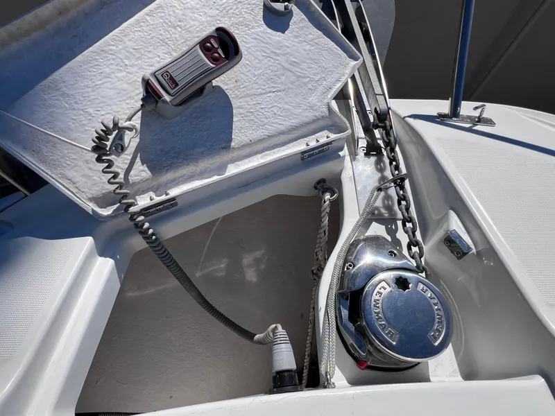 Slide: The Image of 2021 Jeanneau Leader 9.0 WA anchor compartment with winch and control panel. - 46