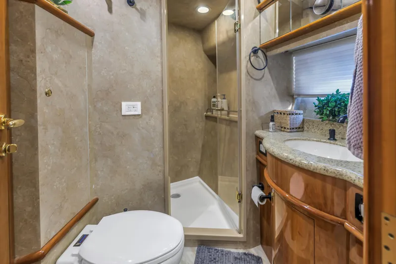 Slide: The Image of Luxurious bathroom in 2007 Neptunus 62 Flybridge yacht with shower and vanity. - 17
