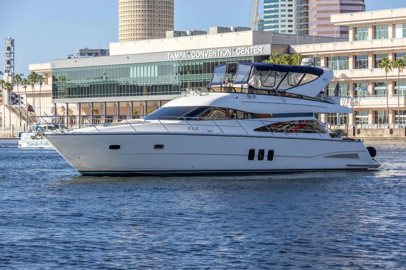Slide: The Image of 2007 Neptunus 62 Flybridge yacht cruising near Tampa Convention Center. - 2