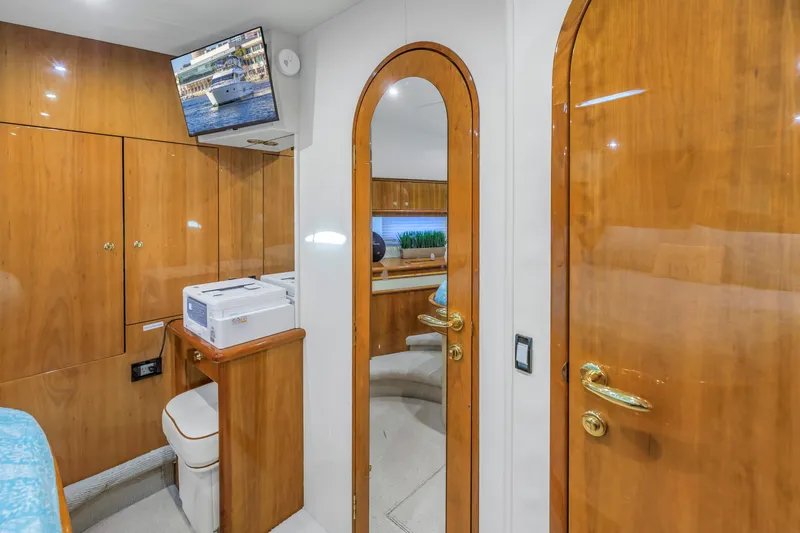 Slide: The Image of Luxurious interior of 2007 Neptunus 62 Flybridge yacht with wood finishes and modern amenities. - 20