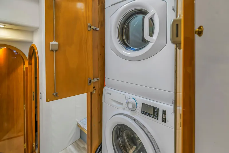 Slide: The Image of Stacked washer and dryer in 2007 Neptunus 62 Flybridge yacht interior. - 24