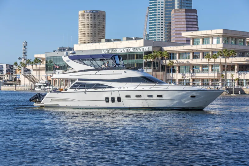 Slide: The Image of Luxurious 2007 Neptunus 62 Flybridge yacht near Tampa Convention Center. - 3