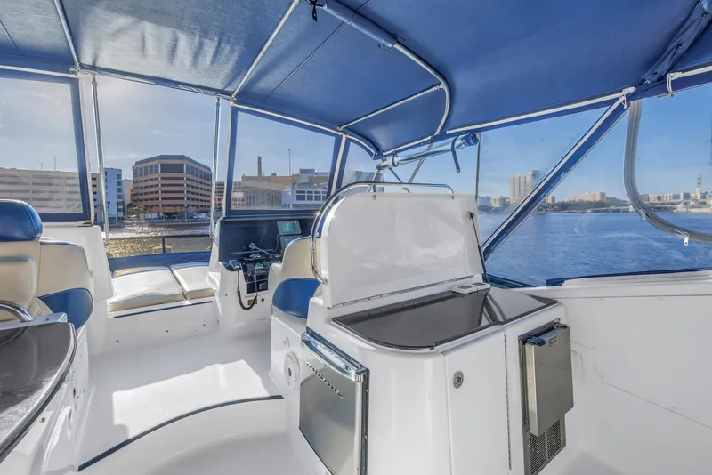 Slide: The Image of Luxurious 2007 Neptunus 62 Flybridge interior with waterfront city view. - 32