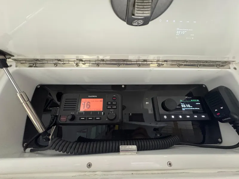 Slide: The Image of 2019 Yellowfin 26 Hybrid boat console with Garmin marine radio and control panel. - 11