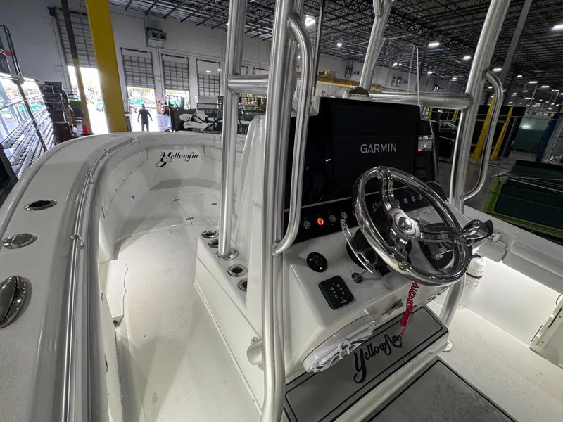 Slide: The Image of 2019 Yellowfin 26 Hybrid boat interior with Garmin navigation system. - 13