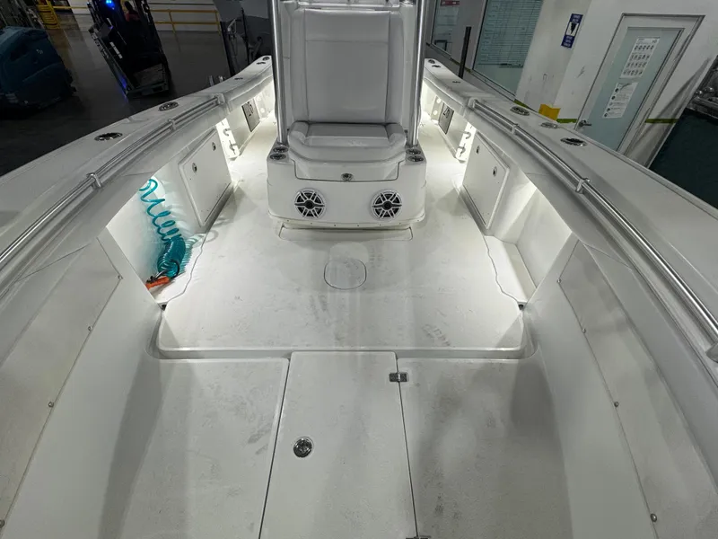 Slide: The Image of 2019 Yellowfin 26 Hybrid boat interior with spacious deck and modern features. - 16