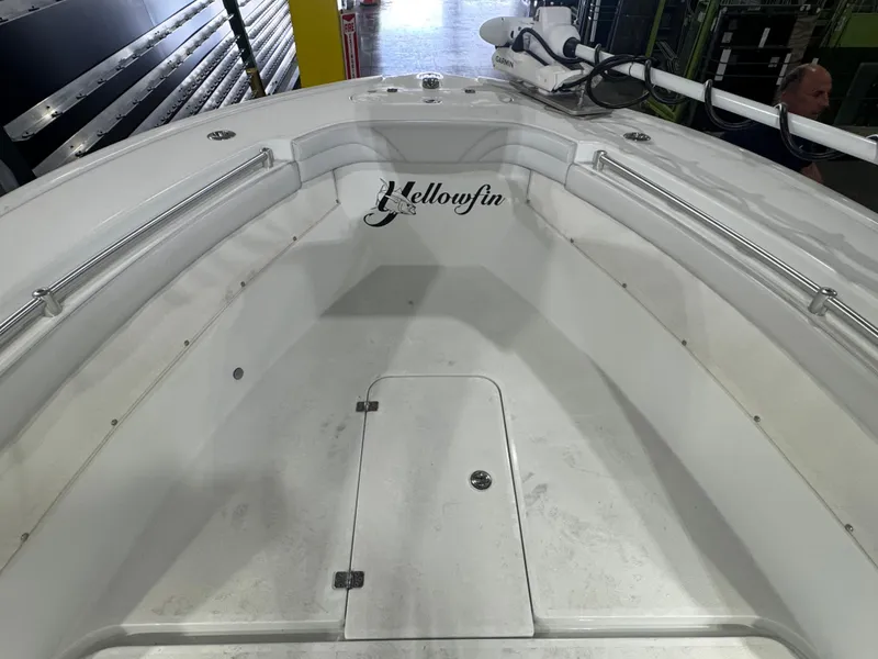 Slide: The Image of 2019 Yellowfin 26 Hybrid boat interior with clean white deck and logo. - 17