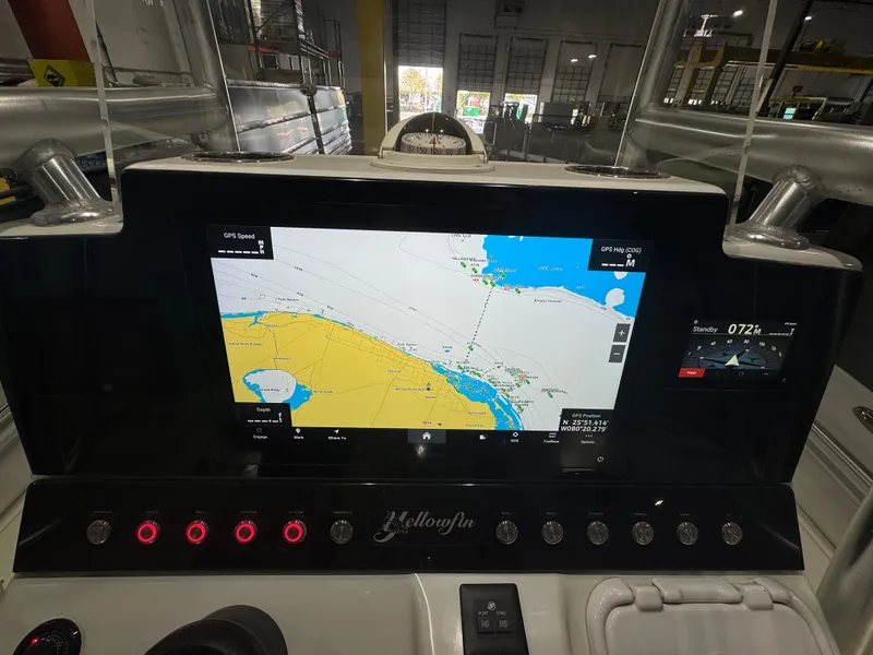 Slide: The Image of 2019 Yellowfin 26 Hybrid boat dashboard with GPS navigation display. - 9