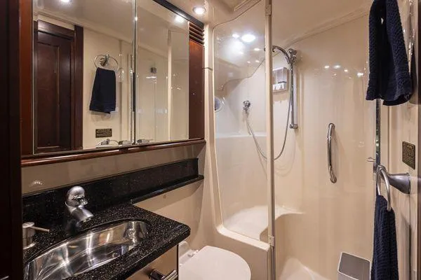 Slide: The Image of Luxurious bathroom in 2005 Sea Ray 520 Sedan Bridge yacht with modern fixtures. - 42