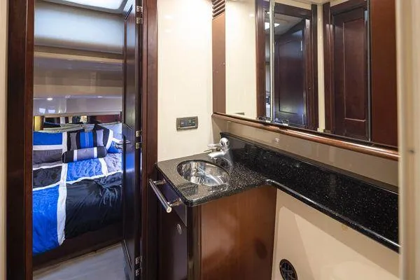 Slide: The Image of Luxurious bathroom and bedroom interior of 2005 Sea Ray 520 Sedan Bridge yacht. - 43