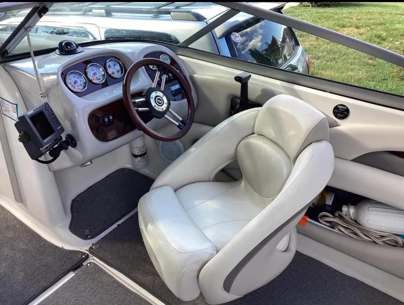Slide: The Image of 2007 Chaparral 204 SSi boat interior with steering wheel and gauges. - 15