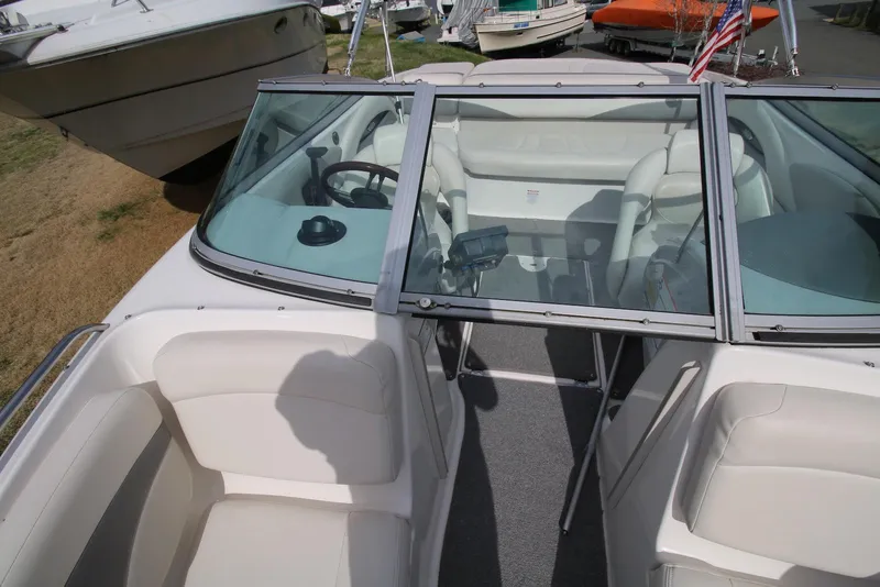 Slide: The Image of 2007 Chaparral 204 SSi boat interior with seating and steering wheel. - 4