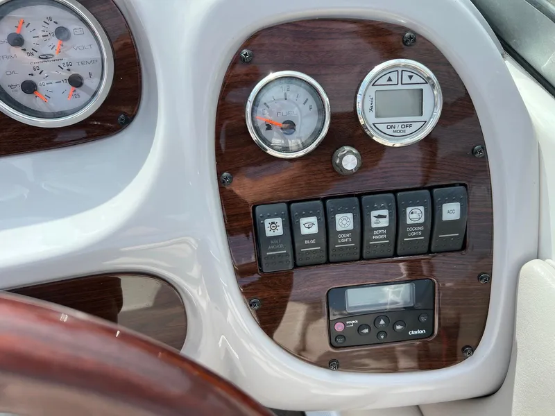 Slide: The Image of Dashboard of a 2007 Chaparral 204 SSi boat with gauges and controls. - 9