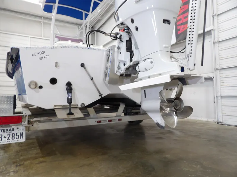 Slide: The Image of Rear view of a 2022 Freedom 18 PATRIOT boat with Yamaha outboard motor. - 7