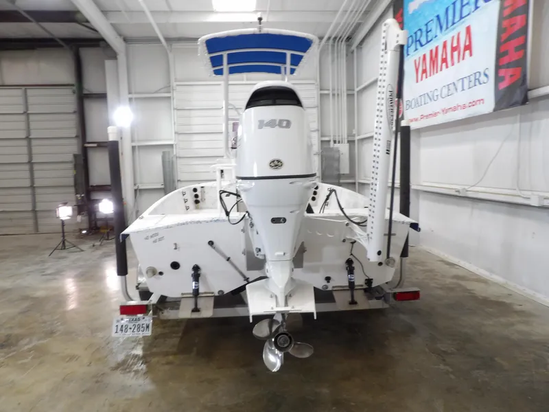 Slide: The Image of 2022 Freedom 18 PATRIOT boat with Yamaha engine in showroom. - 8