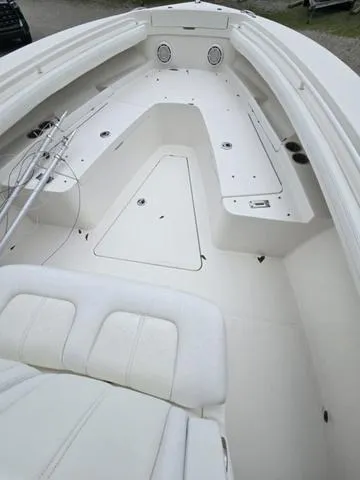 Slide: The Image of 2020 Regulator 23 boat interior with spacious seating and storage compartments. - 4