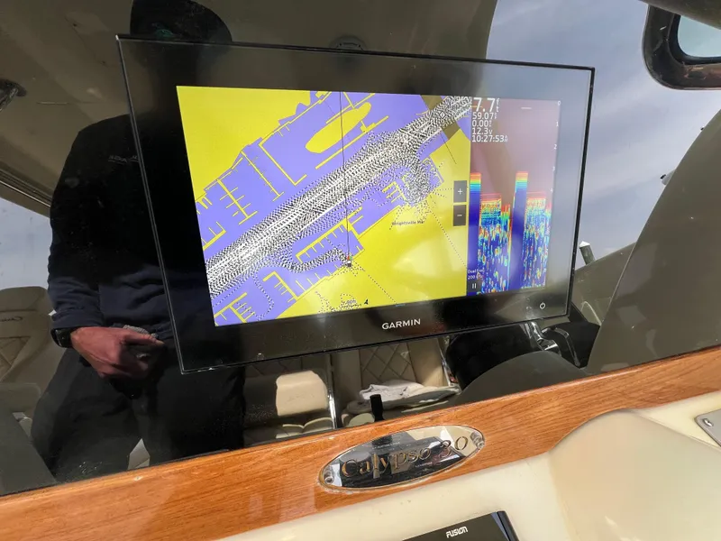 Slide: The Image of Garmin navigation display on 2022 Chris-Craft Calypso 30 boat dashboard. - 21