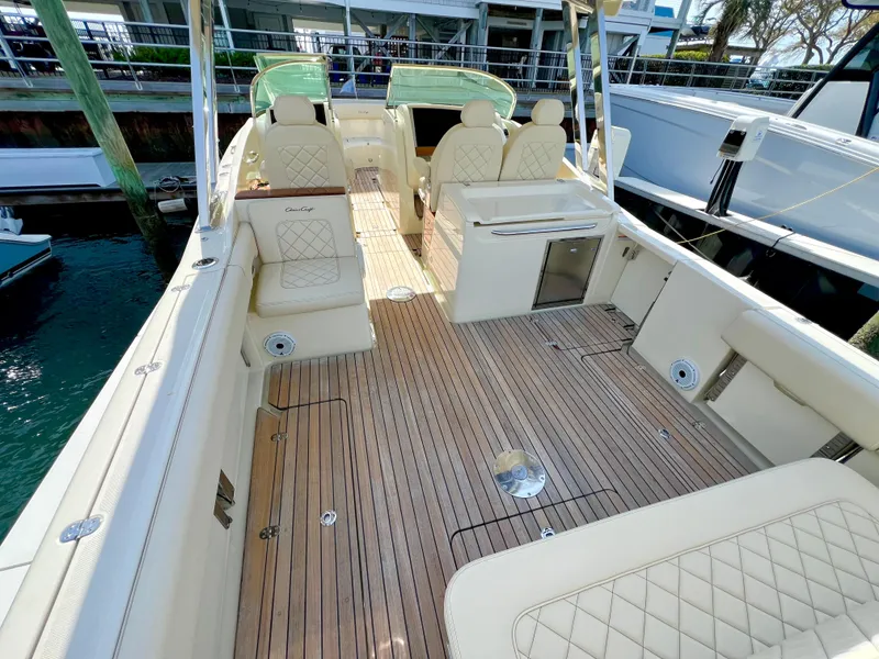 Slide: The Image of 2022 Chris-Craft Calypso 30 boat with elegant seating and teak deck. - 5