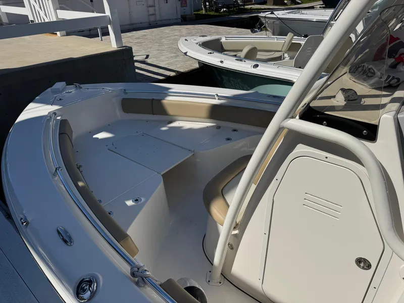 Slide: The Image of 2019 Key West 219 FS boat interior with seating and console. - 3