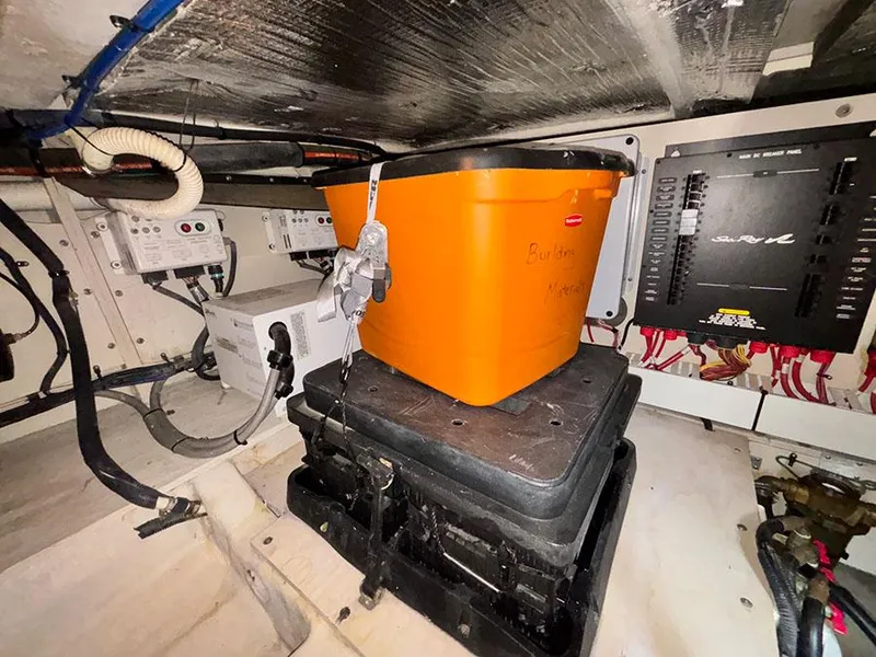 Slide: The Image of Engine room of 2013 Sea Ray 450 Sedan Bridge with equipment and orange container. - 20