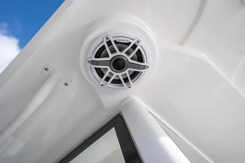 Slide: The Image of Speaker on 2025 Caymas 291 HB boat, mounted on white interior ceiling. - 12