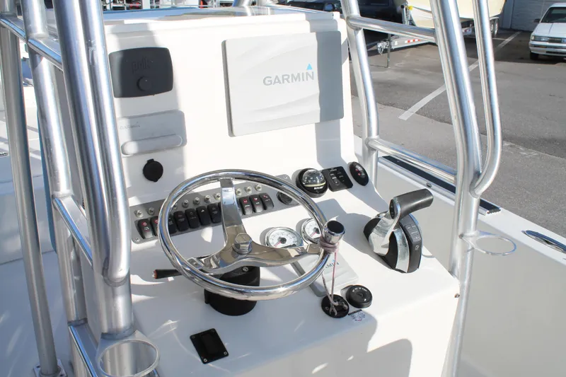 Slide: The Image of 2018 Andros 26 Tarpon boat console with Garmin navigation and steering wheel. - 15