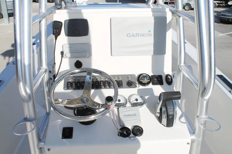 Slide: The Image of 2018 Andros 26 Tarpon boat console with Garmin navigation and control panel. - 16