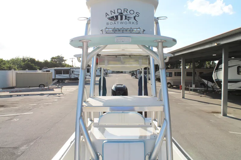 Slide: The Image of 2018 Andros 26 Tarpon boat in storage lot, featuring elevated tower. - 21