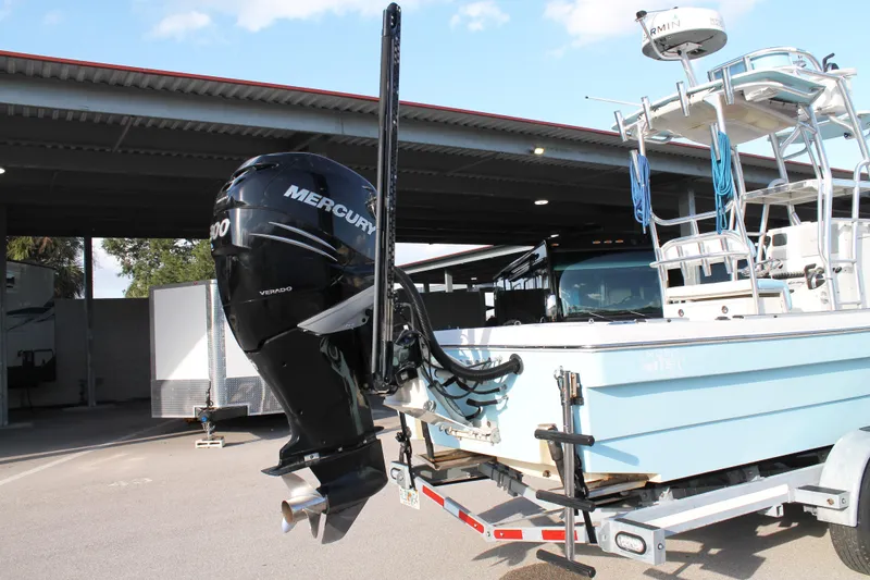 Slide: The Image of 2018 Andros 26 Tarpon boat with Mercury Verado engine on trailer. - 8