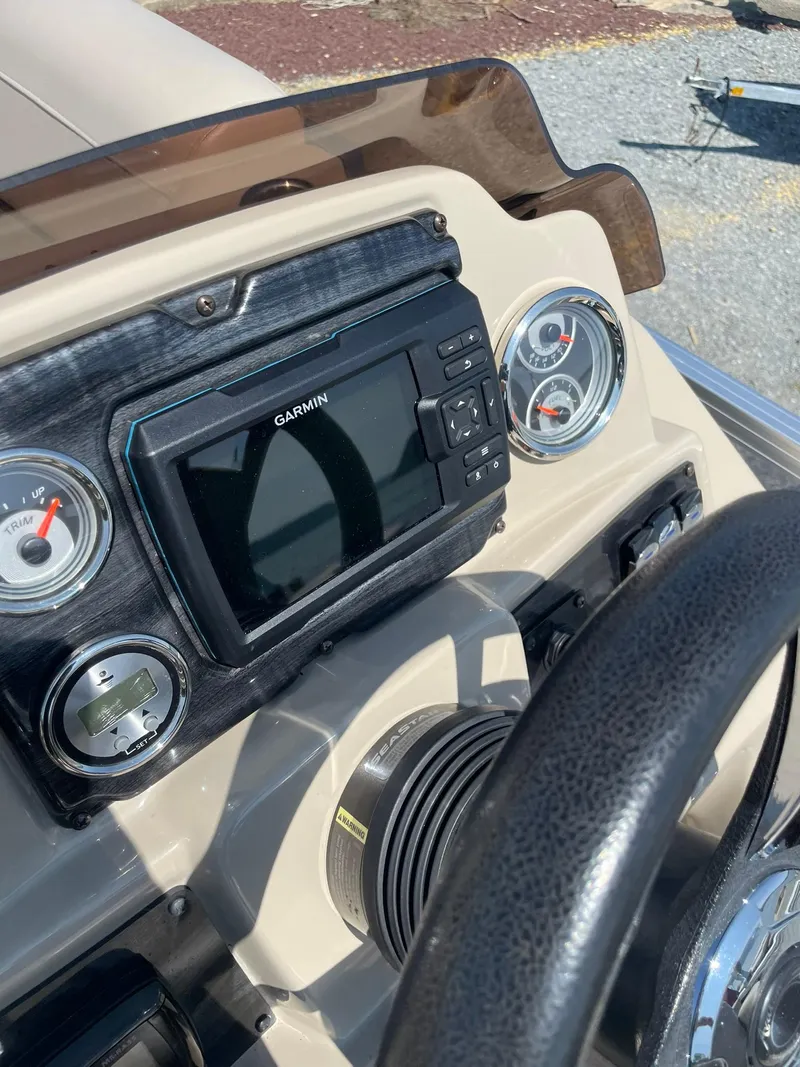 Slide: The Image of Dashboard of 2021 Avalon GS Quad Lounger with Garmin display and gauges. - 18