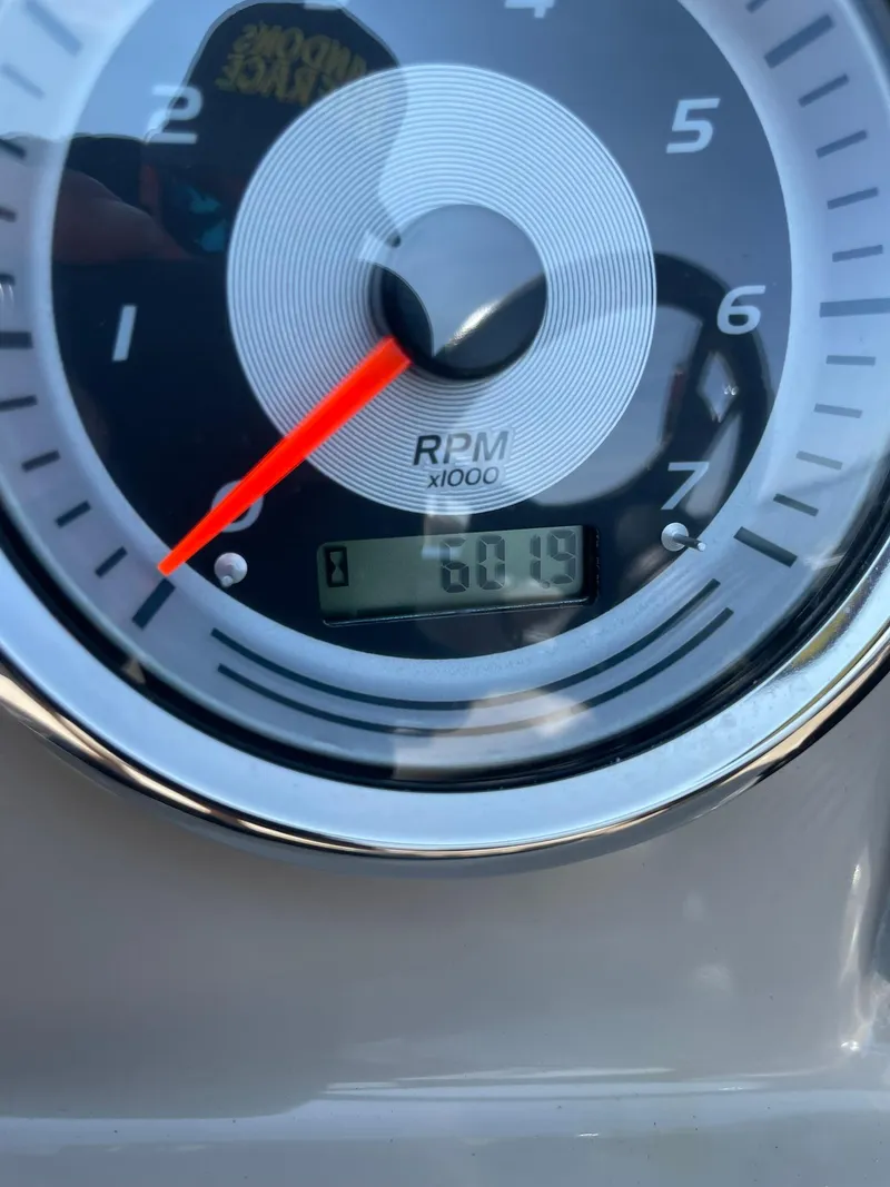 Slide: The Image of Close-up of 2021 Avalon GS Quad Lounger tachometer showing 6019 RPM. - 20