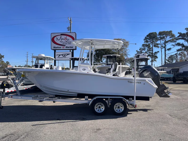 The Image of 2025 Tidewater 210 CC Adventure boat on trailer at Marker 17 Marine dealership. - 0