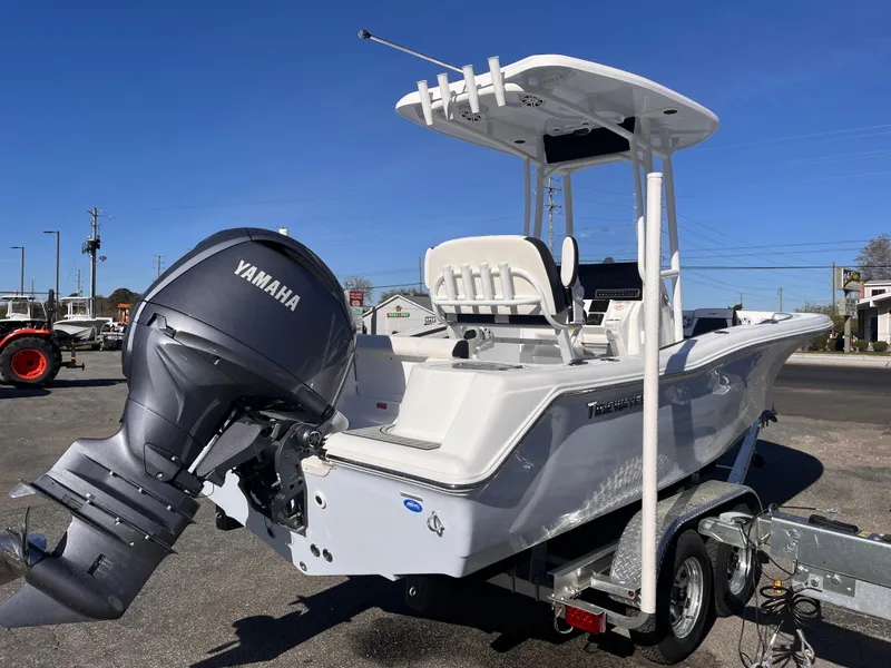 Slide: The Image of 2025 Tidewater 210 CC Adventure boat with Yamaha engine on trailer, sunny day. - 4