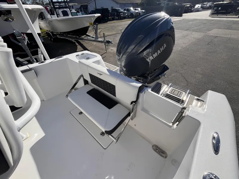 Slide: The Image of 2025 Tidewater 210 CC Adventure boat with Yamaha engine, featuring a foldable seat. - 6