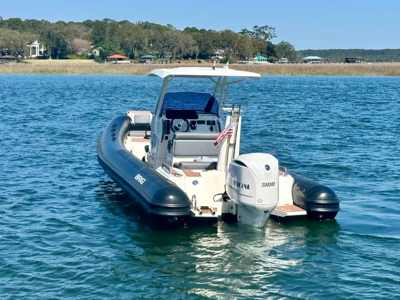 Slide: The Image of 2021 Brig Eagle 8 boat with Yamaha engine on calm water. - 11