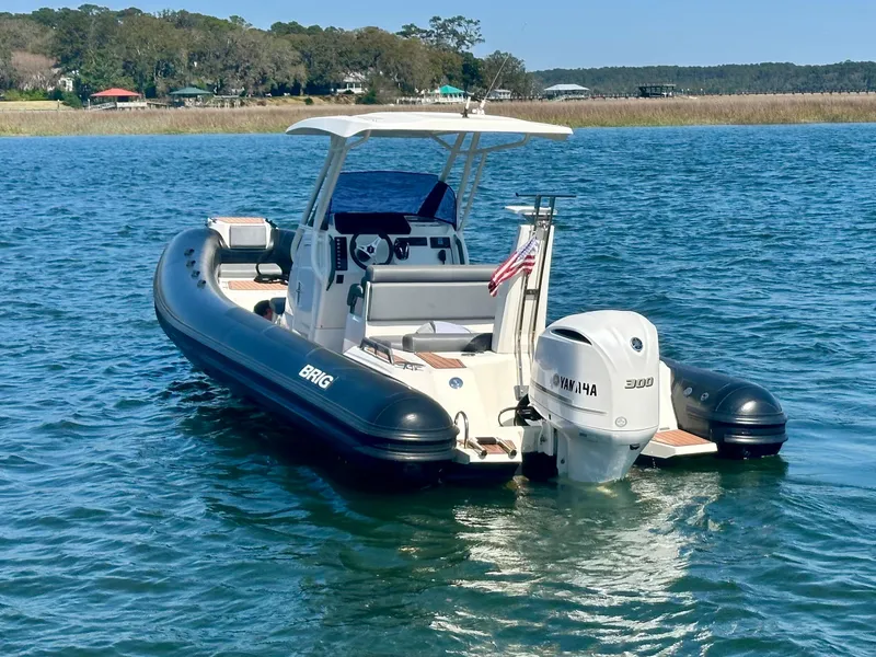 Slide: The Image of 2021 Brig Eagle 8 boat with Yamaha engine on calm water. - 3
