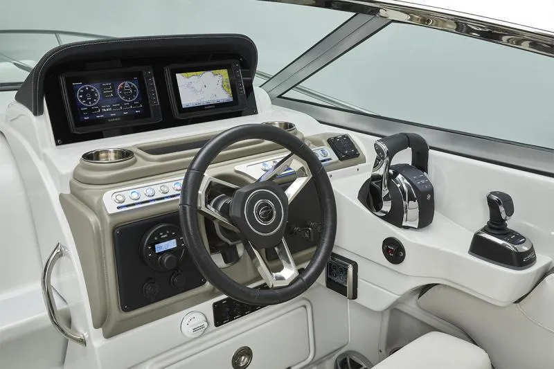 Slide: The Image of 2024 Crownline 280 CRX boat dashboard with modern controls and navigation displays. - 10