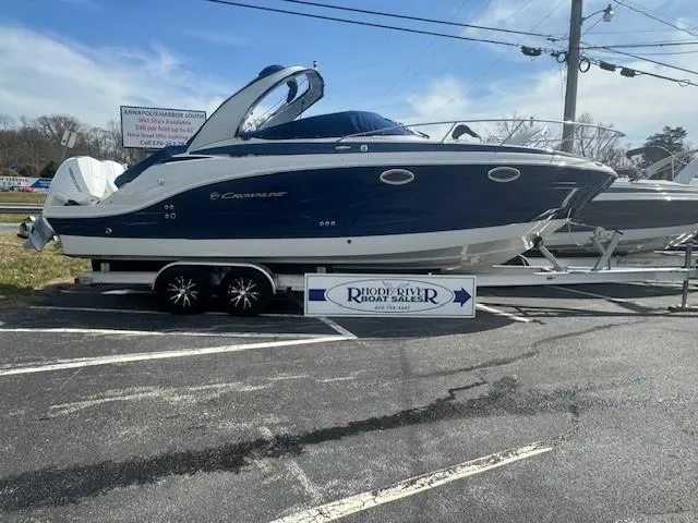 Slide: The Image of 2024 Crownline 280 CRX boat on trailer at dealership, side view. - 3